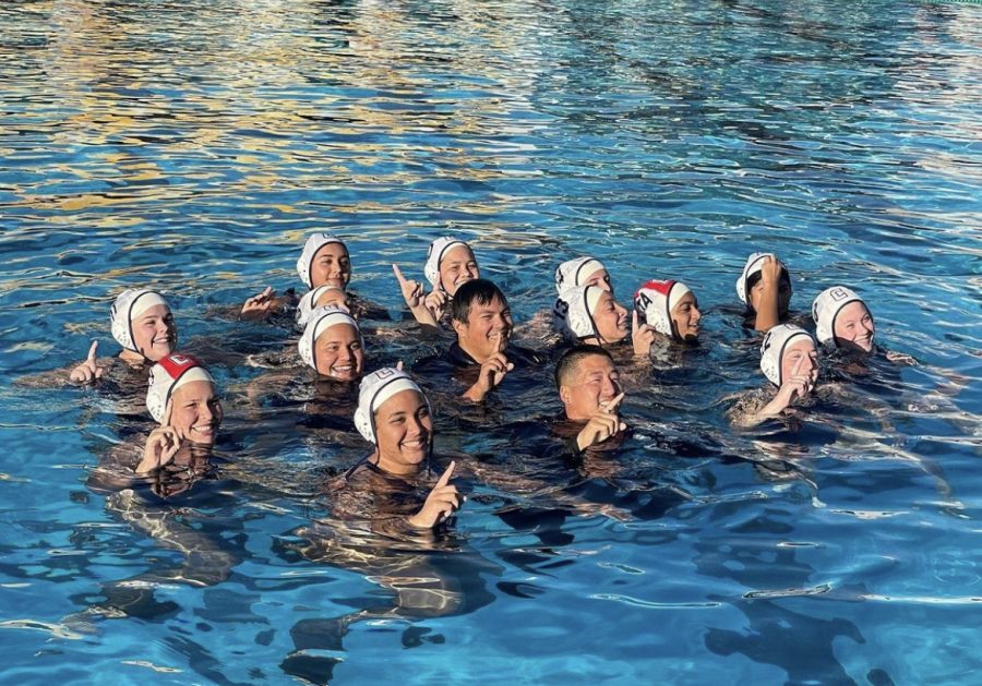 Our Varsity Girls Water Polo team celebrates their Empire League championship.