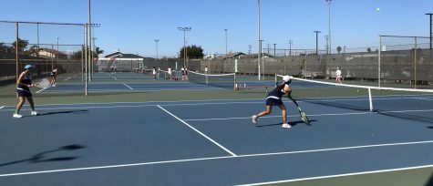 The girls tennis team 
 competed against Kennedy at home, and also just defeated Pacifica 13-5.