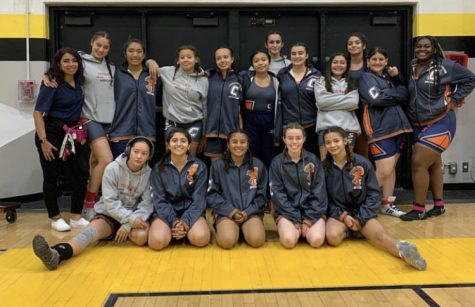 The Girls Wrestling team is united as a family. 