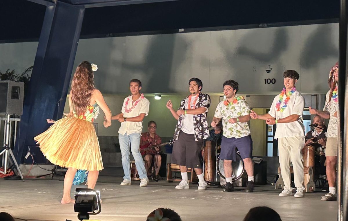 A few lucky seniors participated in the hula dance on stage.