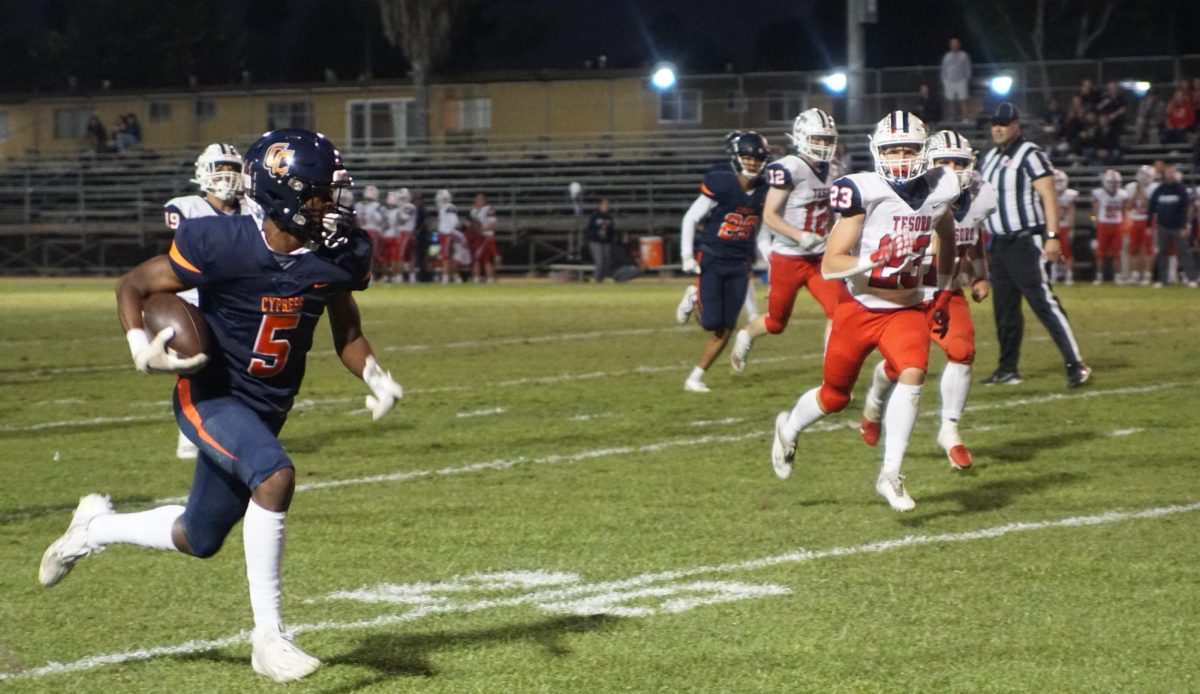 Wide Receiver Michael Hubbard races down the field against Tesoro.