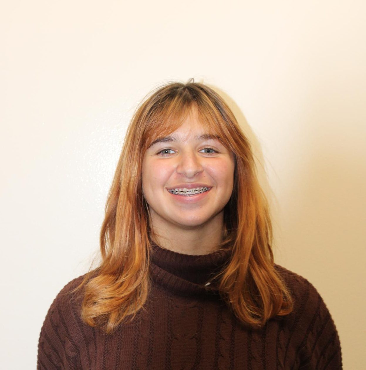 Freshman Roxy Wilson balances her first semester in high school and playing on the tennis team.
