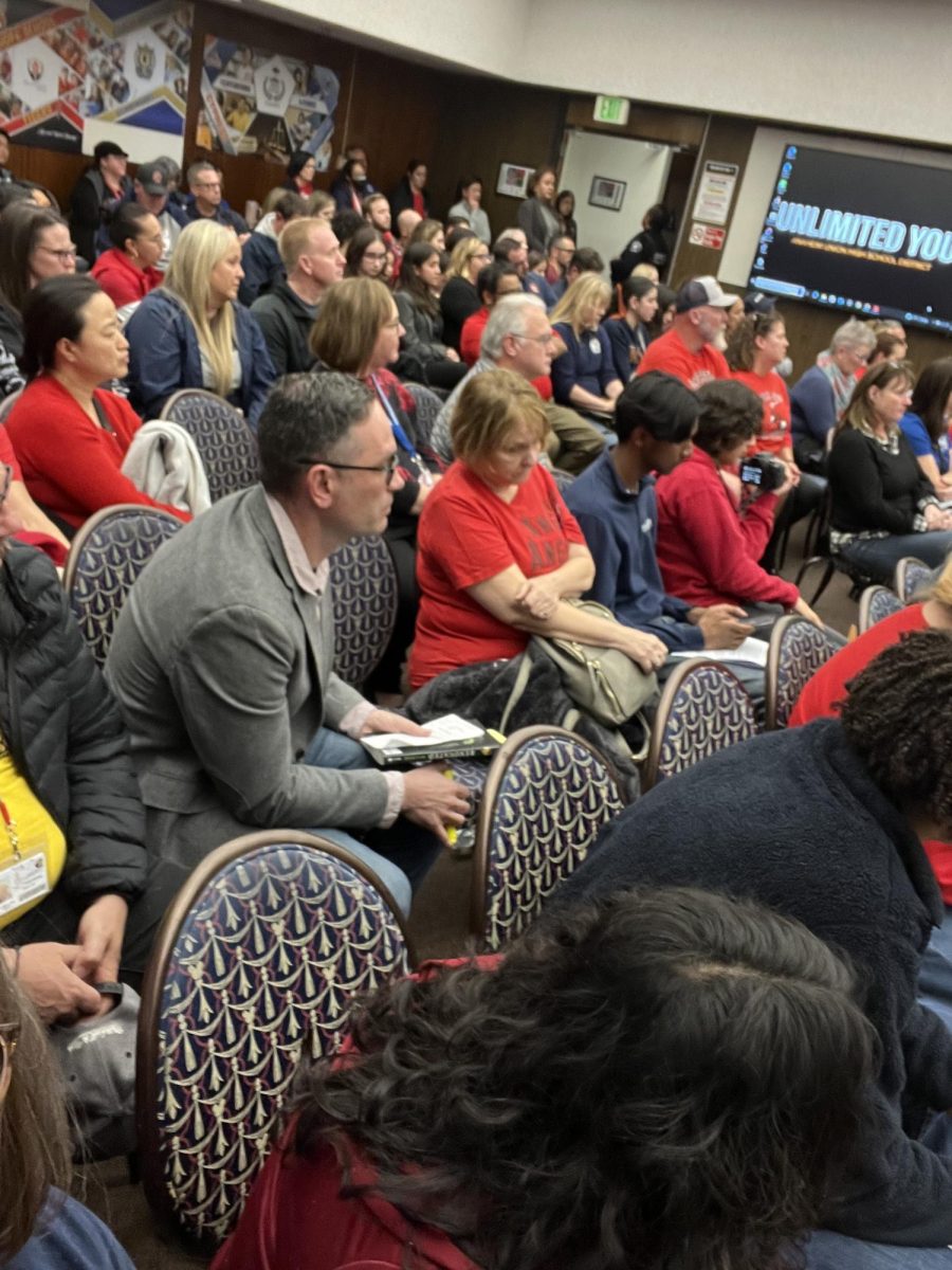 So many students, staff, and community members were present at the School Board meeting that two overflow rooms were required.
