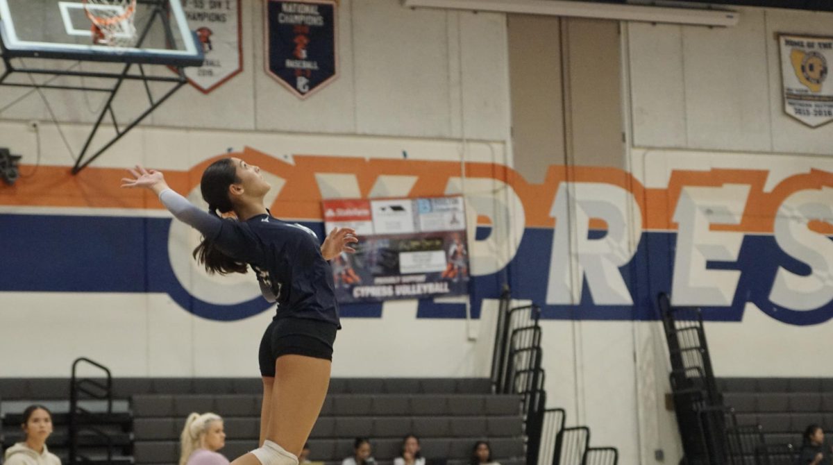 Isabella Faro serves against Esperanza in the last home game of the regular season.