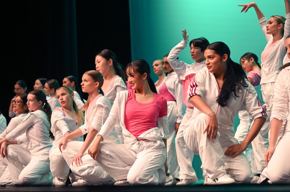 Advanced Dance poses at the end of their dance 'Needle.'
