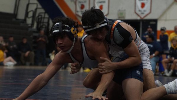 Varsity wrestler Lincoln Chung brings in a win for Cypress High's Wrestling Team.