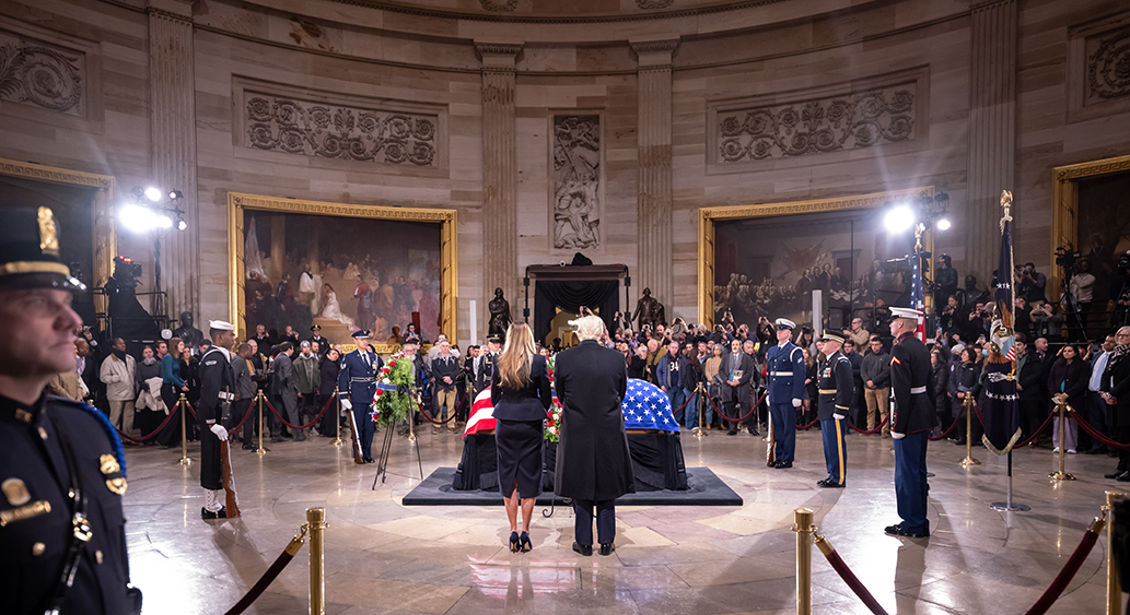 Donald Trump and his wife paying respects to former President Jimmy Carter.