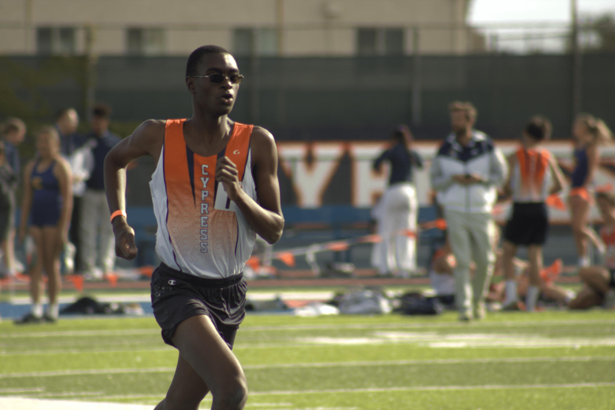 Record-breaking senior William Masanja stays focused on the last lap of his race.