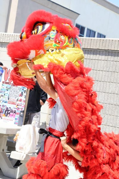 Raymond Le and Dominic Cao dance their hearts out to celebrate Vietnamese Culture