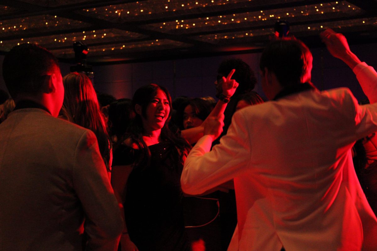 Students danced the night away at Winter Formal's "Night in Paris," like sophomore Joy Kim.